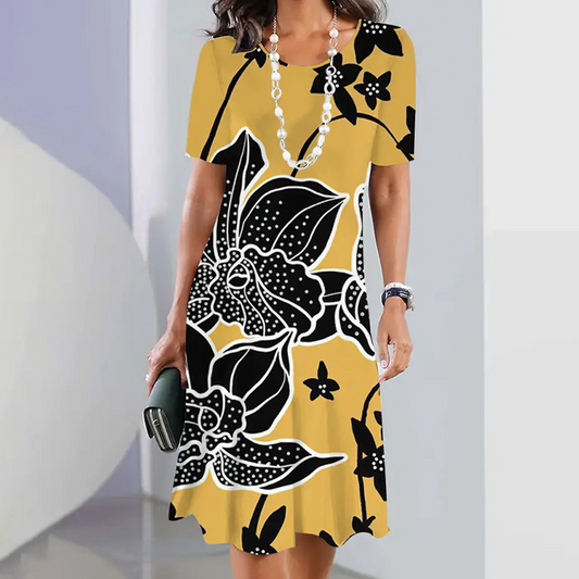 Damska sukienka midi z nadrukiem i okrągłym dekoltem