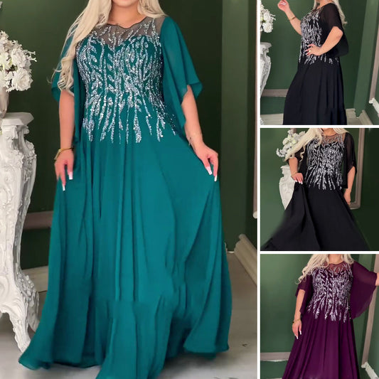 Elegancka suknia wieczorowa z kryształowej siateczki z okrągłym dekoltem.